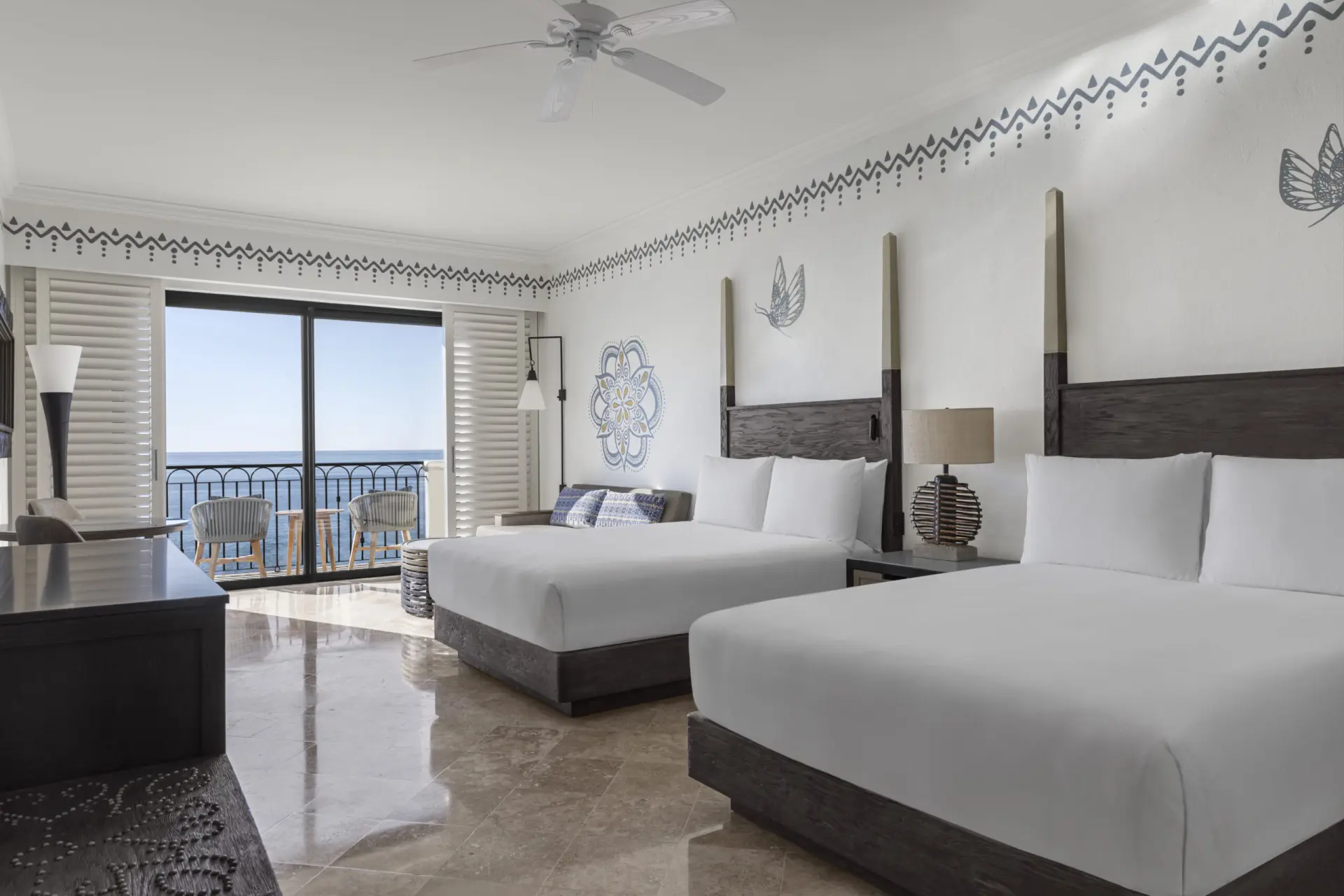 picture of a room with two double beds