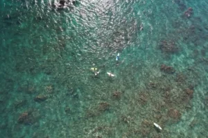 Axel image of the sea with some boats.