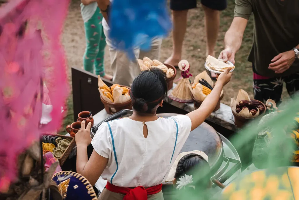 picture of waitress serving food from food booth